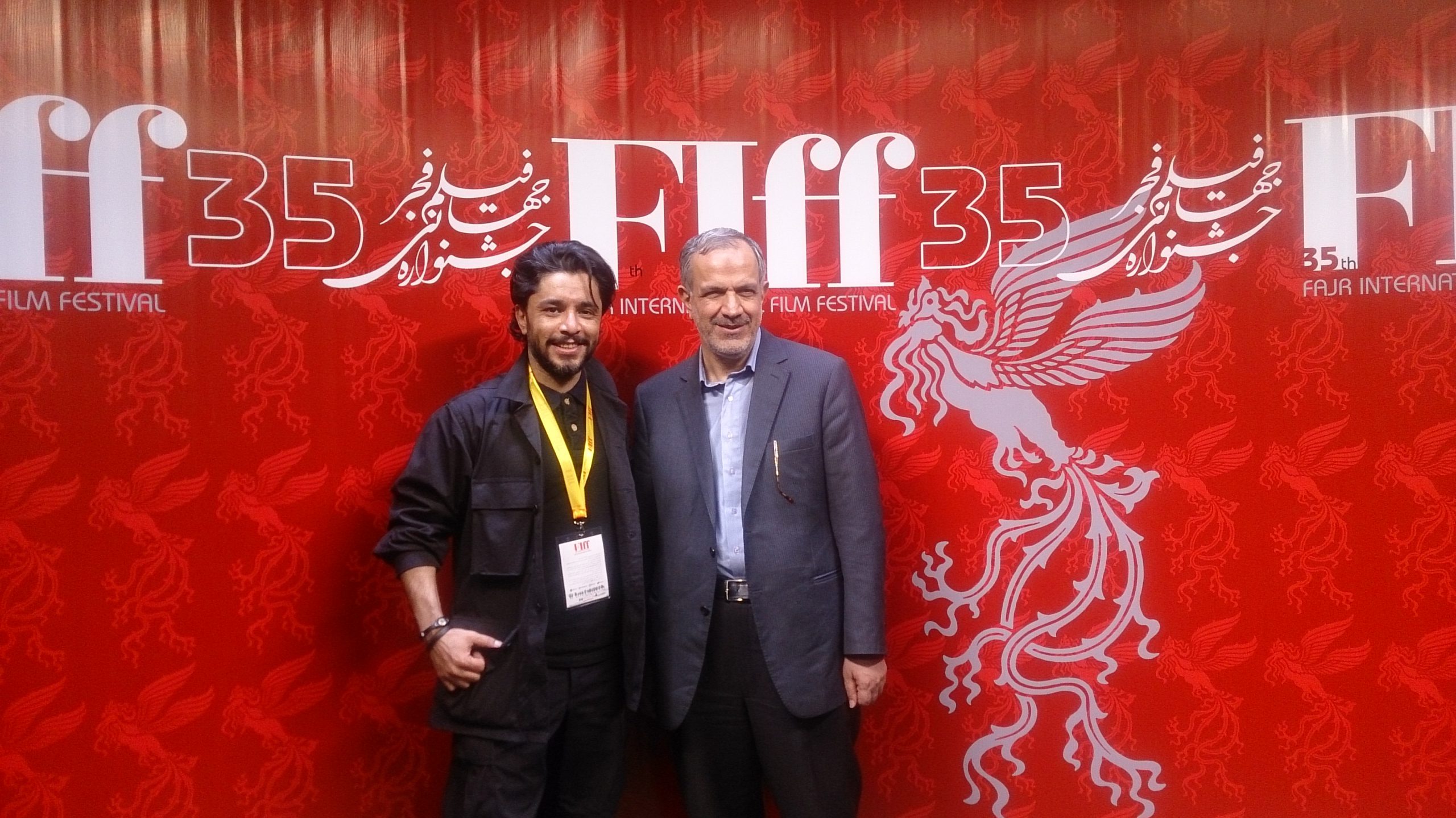 arash bahmani and the Ahmad masjed jamei the minister of art of Iran are posing for cameras