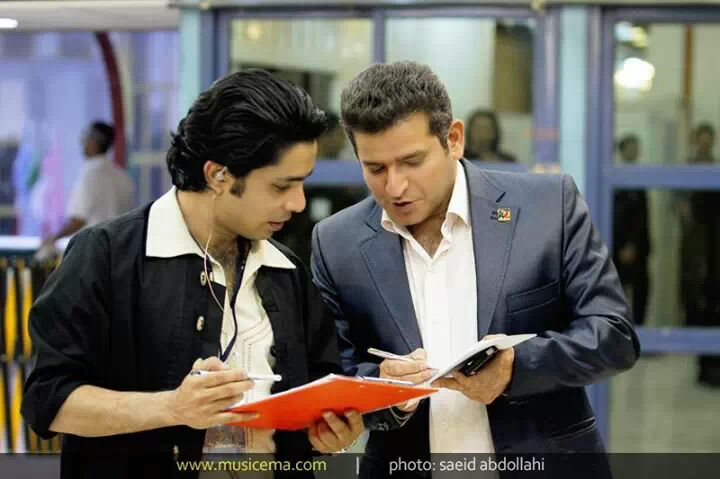 arash bahmani with majid toosi planning a concert behind the stage