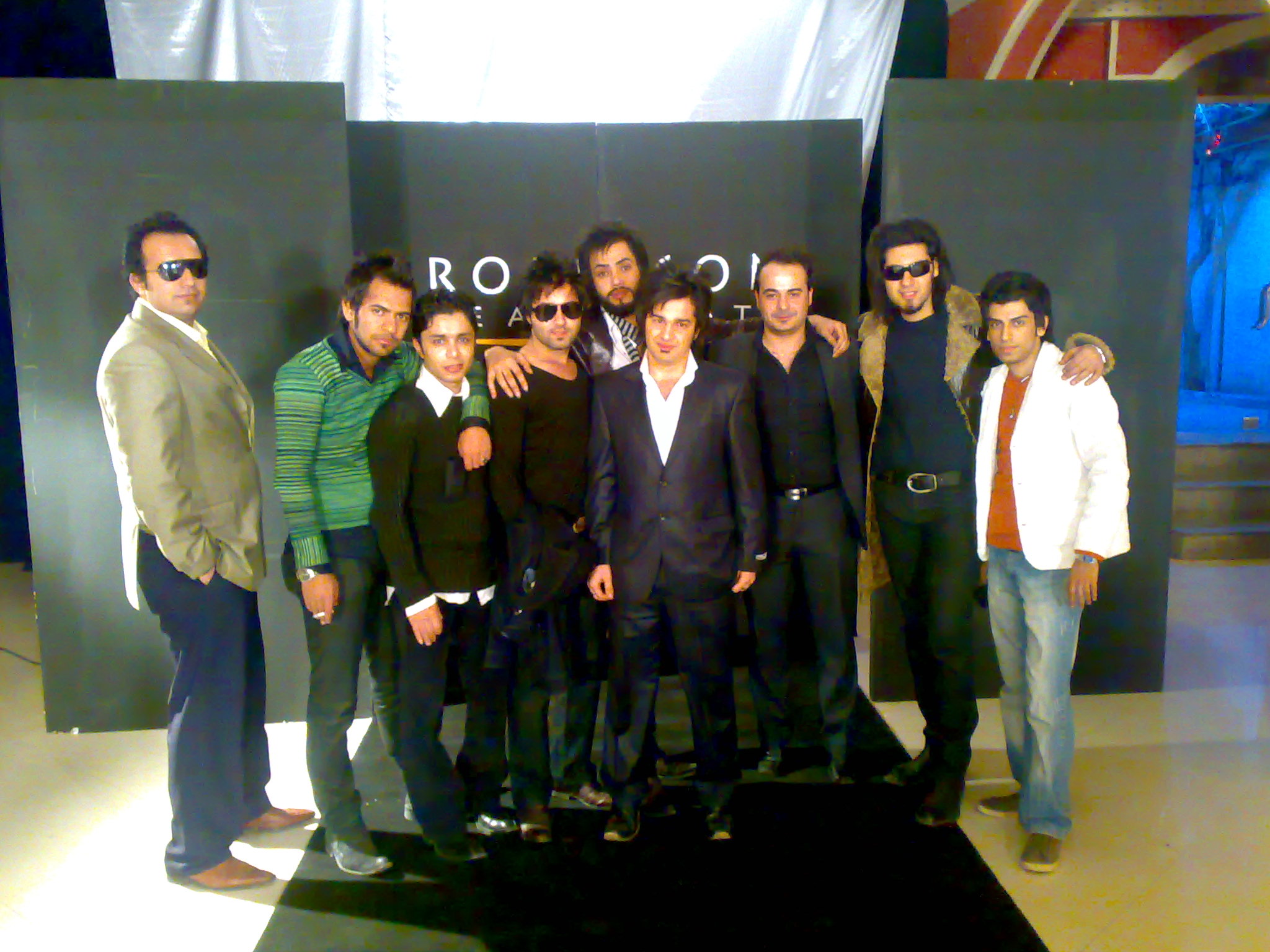 arash bahmani with the black shirt in a picture of backstage of mehdi modarres music video directed by Arash